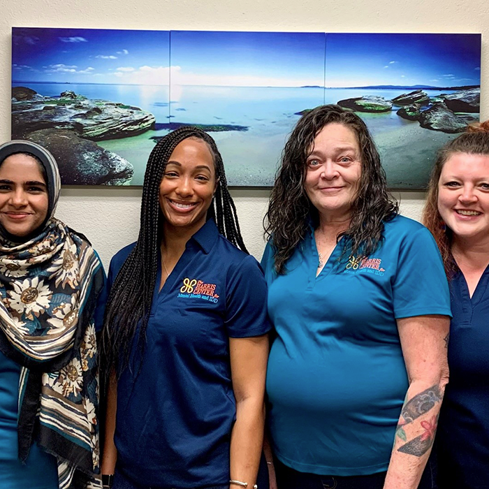 A photo depicting the diverse representatives of the Harris Center.