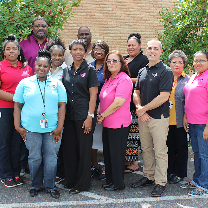 A group photo of the diverse members of the PATH team.