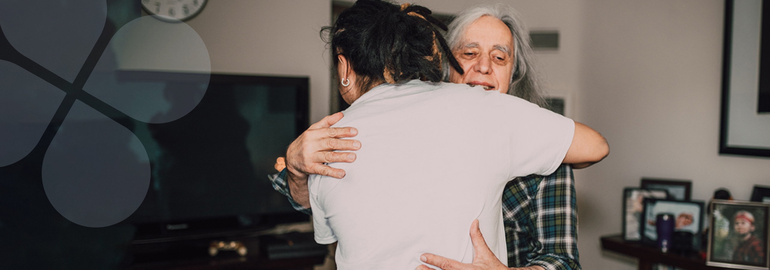 Professional and client in a congradulatory embrace