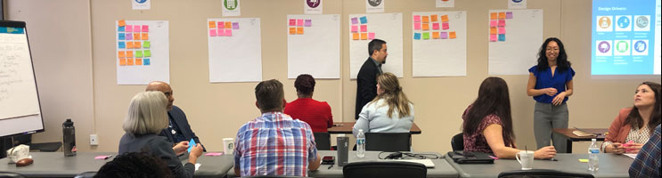 Harris Center employees going over the details of the Northeast Expansion