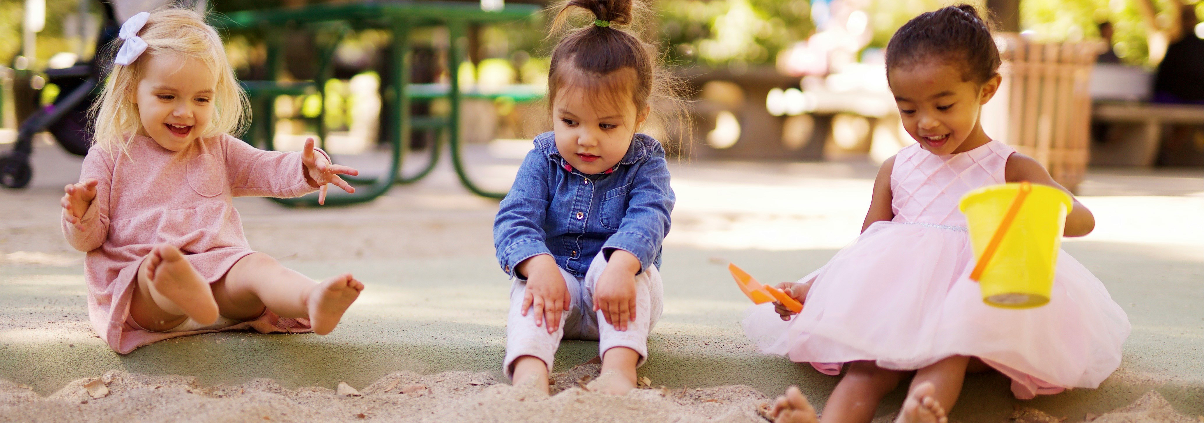 Children playing happily in sand