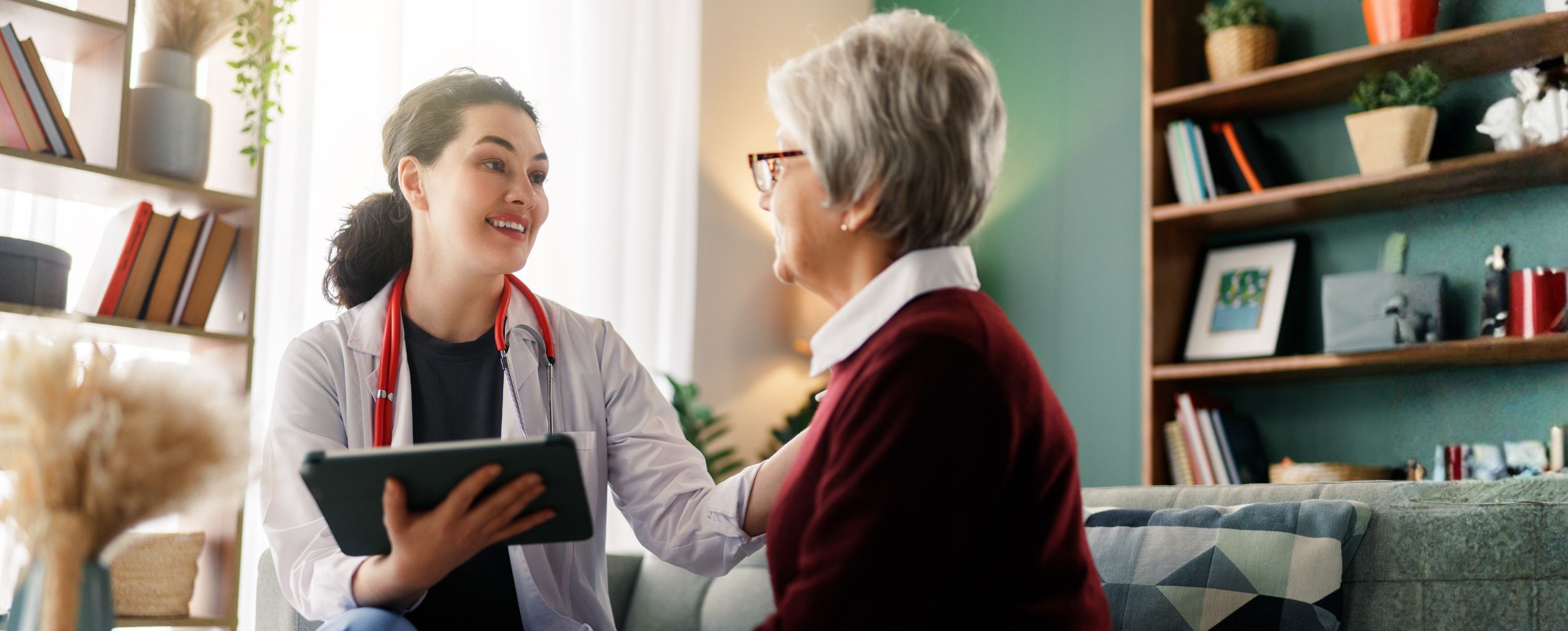 Woman getting a checkup with her doctor.